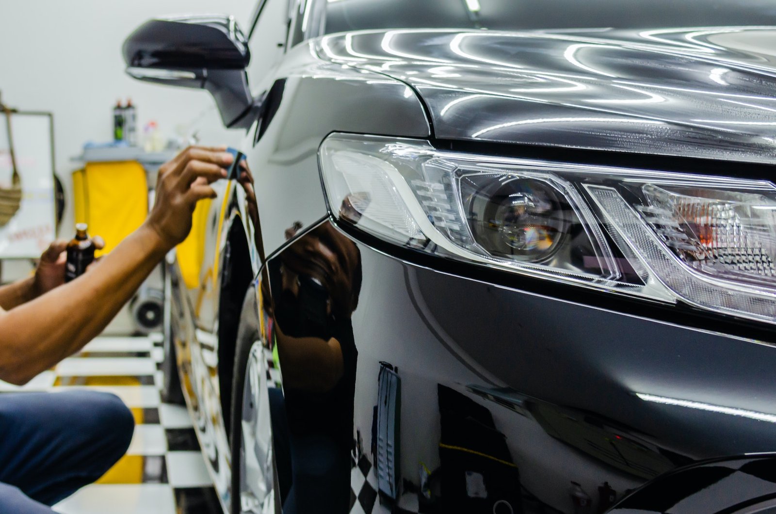 Process of ceramic glass coating of a car